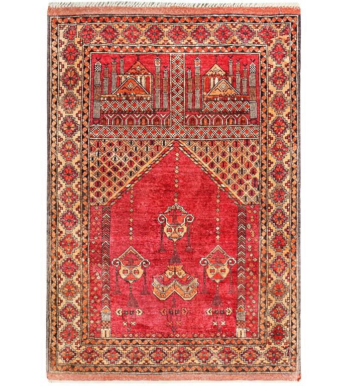 A silk Beluch rug, c. 124 x 81 cm.