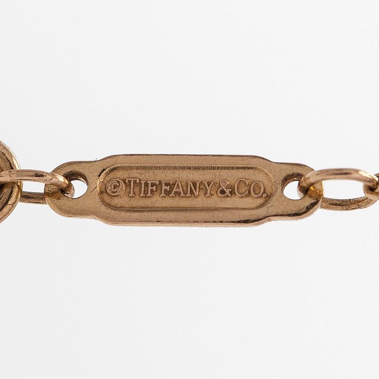 Tiffany & Co, kaulakoru, "T Smile", 18K kultaa ja briljanttihiottuja timantteja.