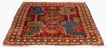 A 17th century 'four-lobed-star-medallion rug', central Anatolia, c. 193 x 134 cm.