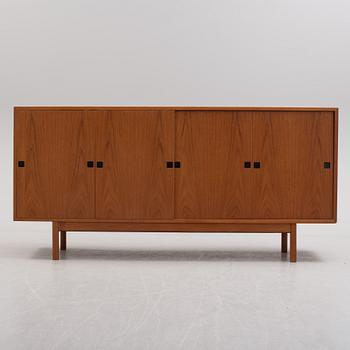 A second half of the 20th century teak veneered sideboard by Central Møbler Bolighus, Denmark.