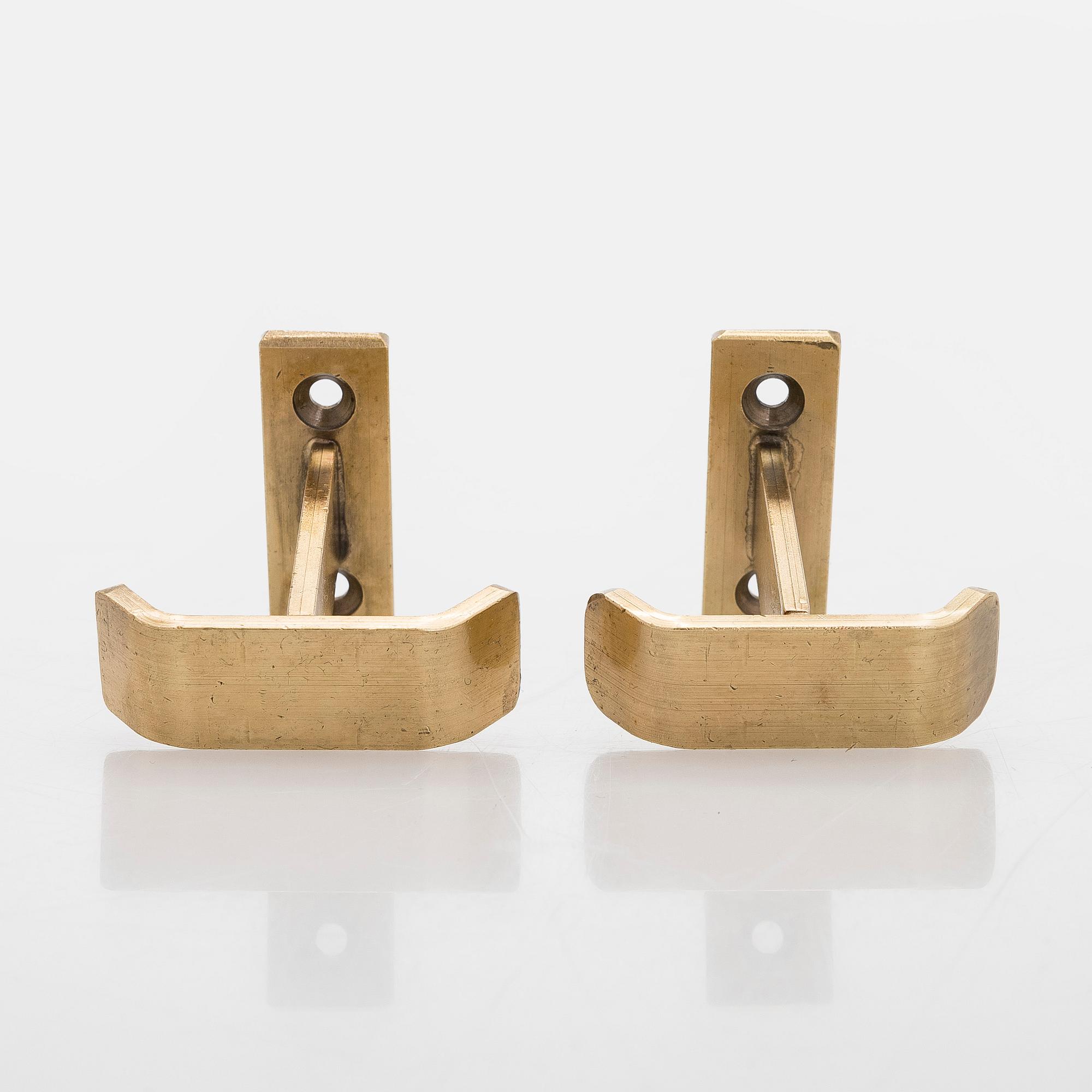 A set of 19 coat hooks, 1960s/70s.