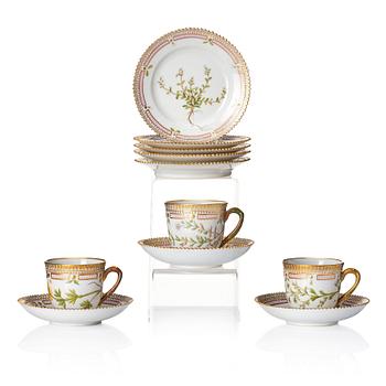 A set of 3 Royal Copenhagen 'Flora Danica' coffee cups with stands and 5 small dishes, Denmark, 20th Century.