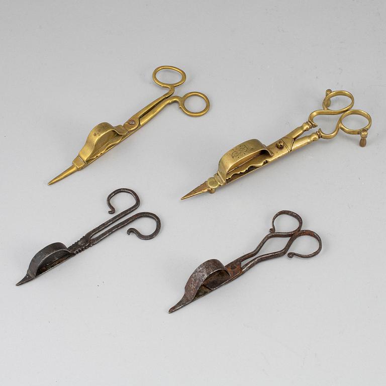 Four 18th century bronze and iron candle snuffers.