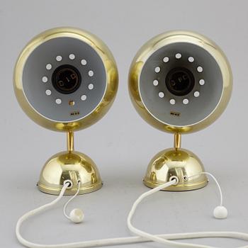 A pair of 1970's wall lamps.