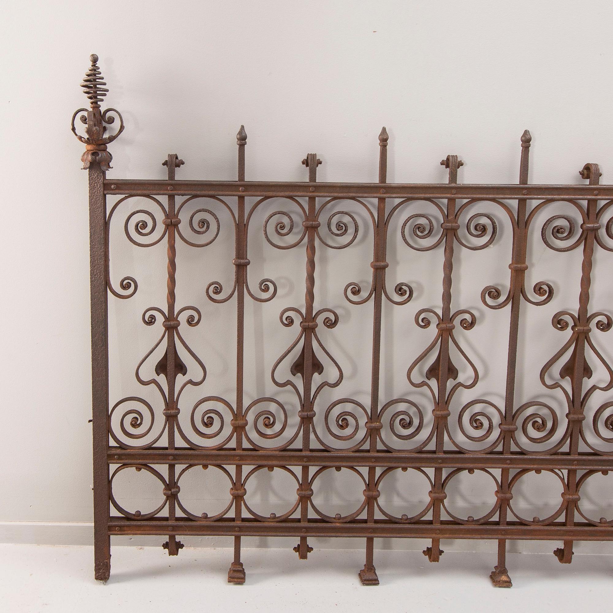 A cast iron fence around 1900.