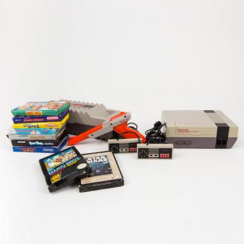 NINTENDO, NES 8-bits konsol med 11 stycken spel, Japan, 1980/90-tal.