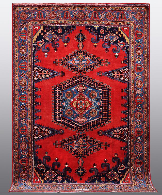 A CARPET, Wiss Signed Sharbani.  327 x 227 cm.