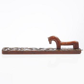 A carved and polychrome painted mangle board, Sweden, late 18th / early 19th century.