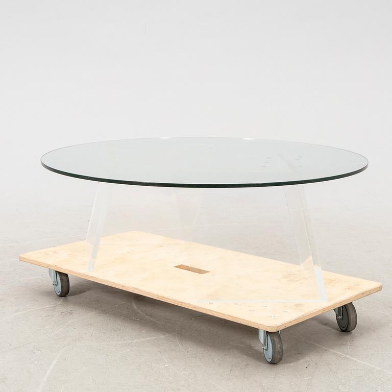 A late 20th century glass and plexi coffee table.
