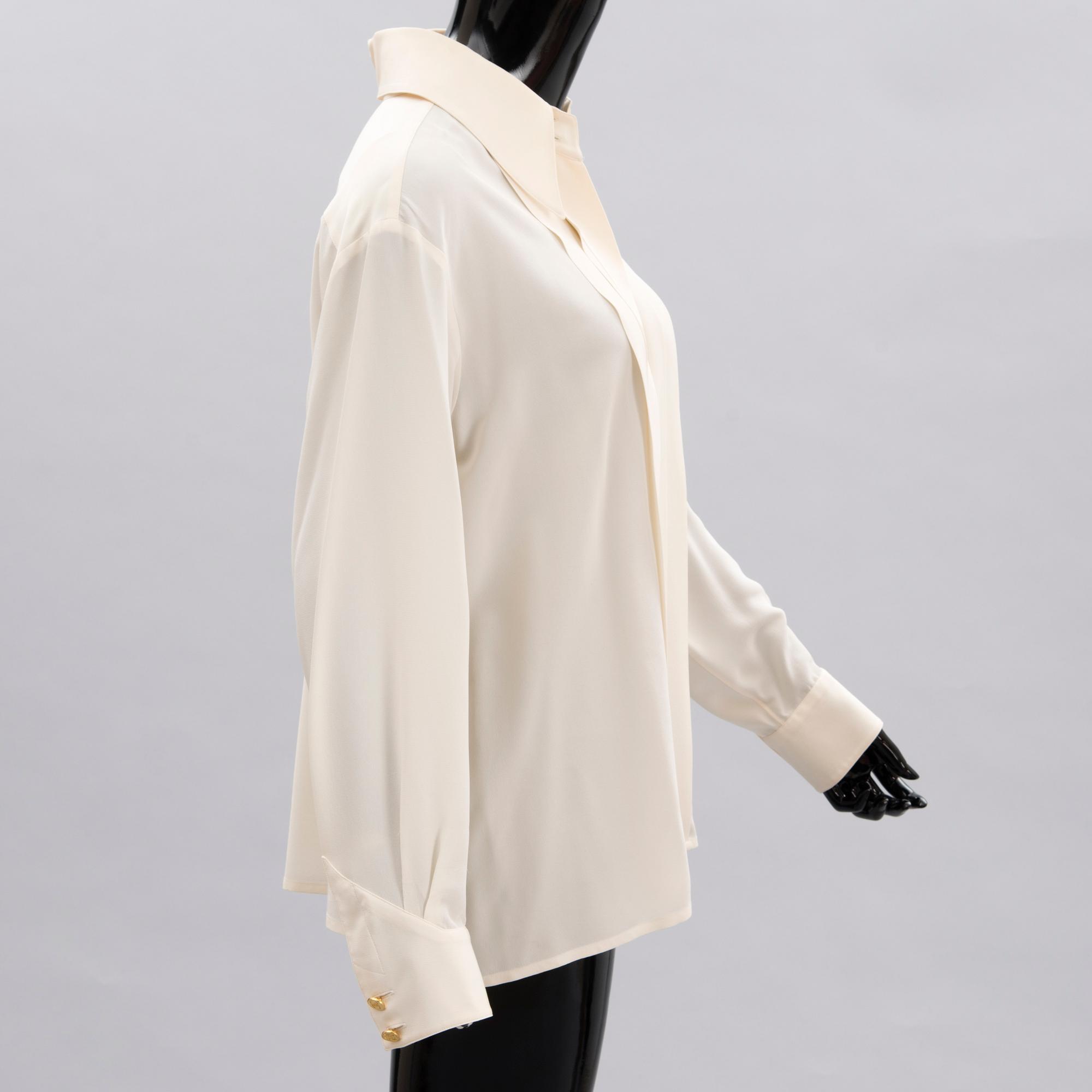 Two Chanel Crepe de Chine Cream Coloured Silk Blouses.
