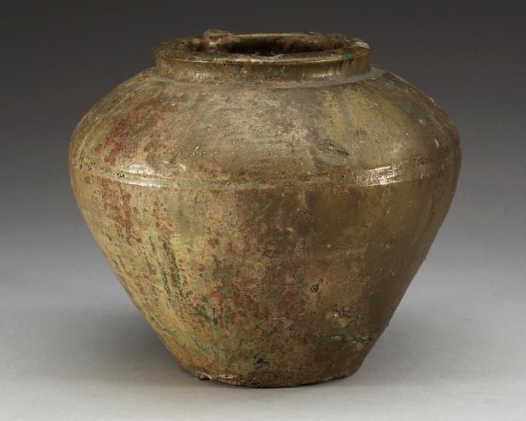 A green glazed potted jar,  Han dynasty (206 BC - 220 AD).
