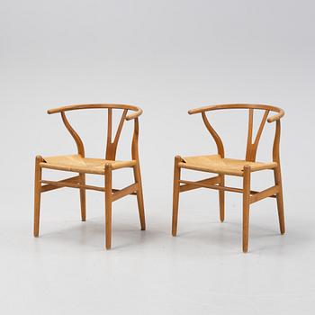 A pair of oak 'Y-chairs' by Hans J Wegner for Carl Hansen & Son, designed 1949.