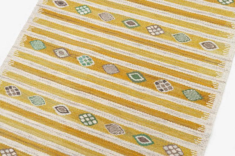 Barbro Nilsson, a carpet, 'Hjortron', flat weave, c. 137 x 87 cm, signed AB MMF BN.