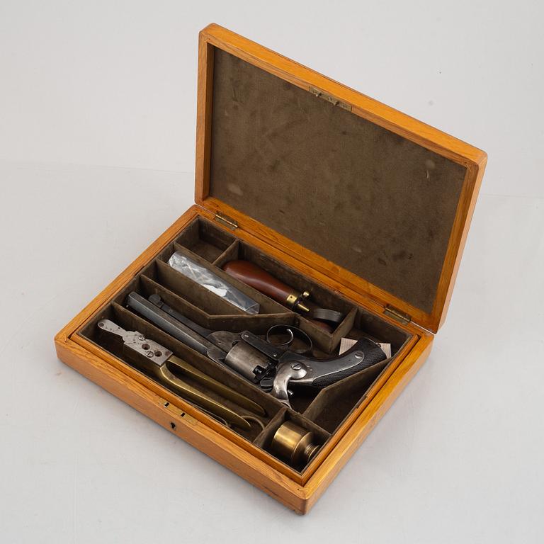 A cased Kerr patent double action percussion revolver. London Armoury Company. Serial no 11395.