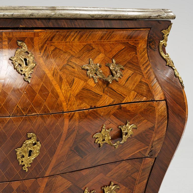 A Swedish rococo parquetry commode attributed to J. Noraeus (master in Stockholm 1769-81).