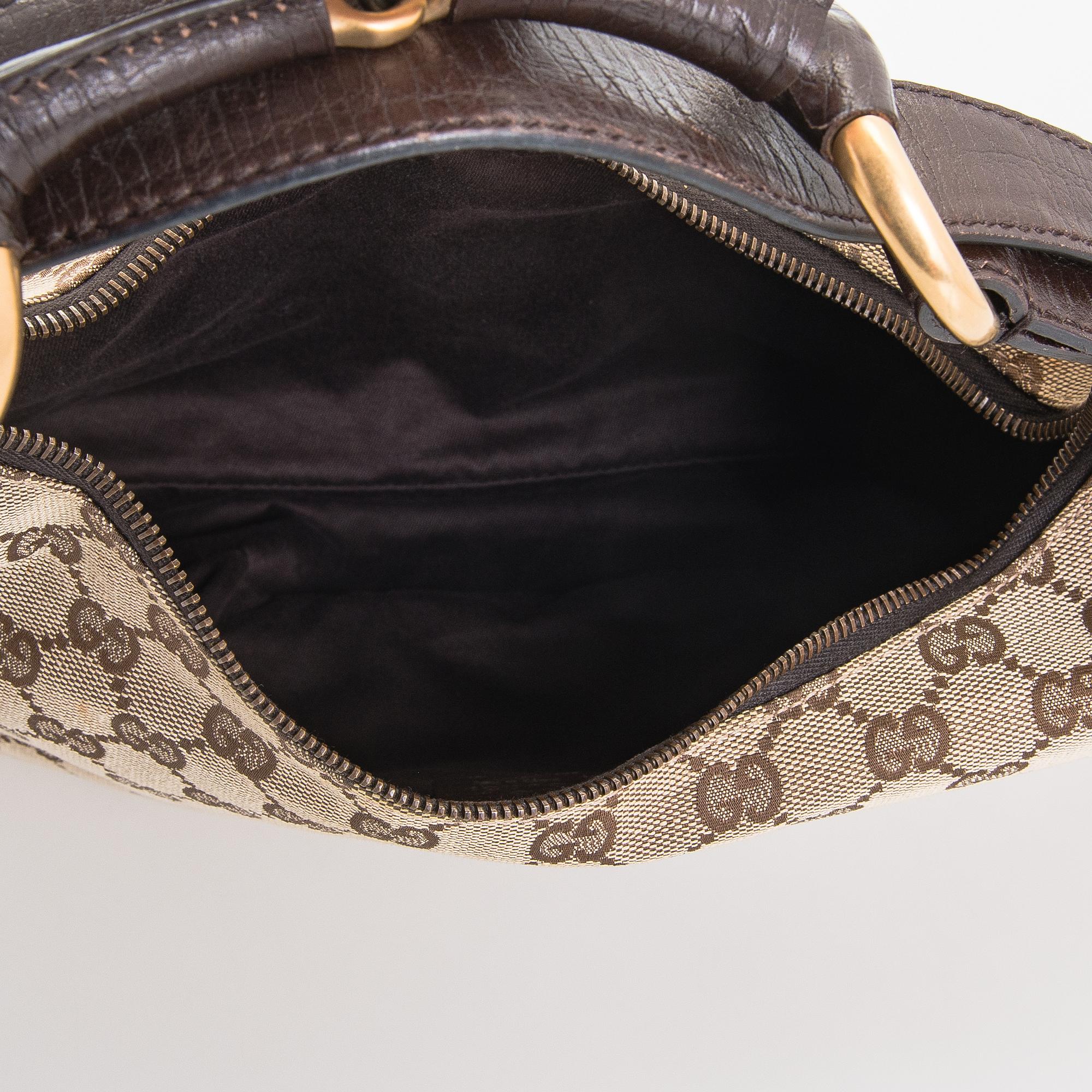 Gucci, a 'Horsebit GG Canvas Hobo Bag'.