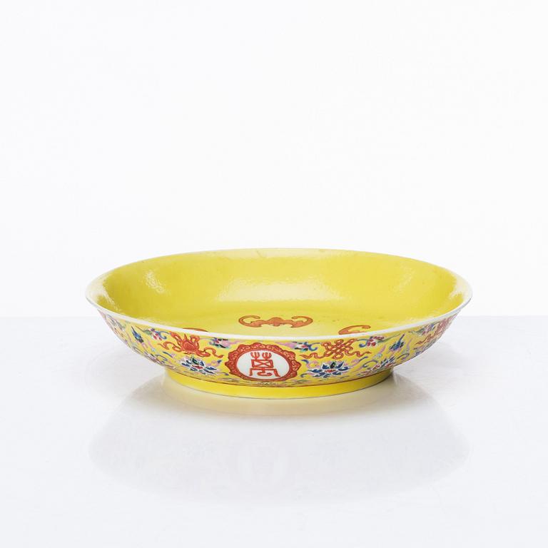 A Chinese famille rose yellow ground 'bat' dish, Qing dynasty with Jiaqing mark.