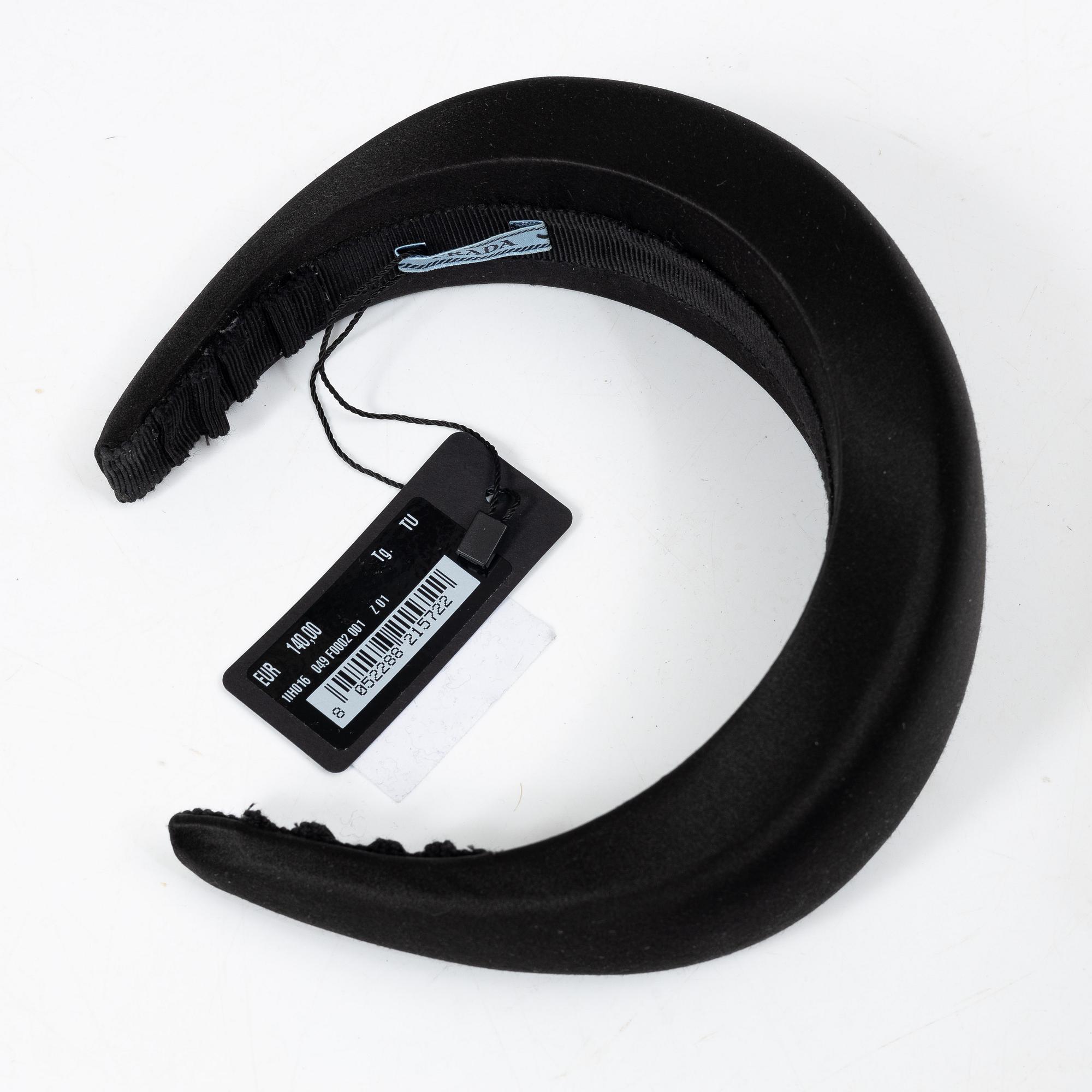 Prada, A black silk hairband.