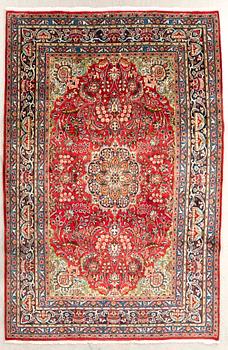 An old Sarouk carpet 300x200 cm.