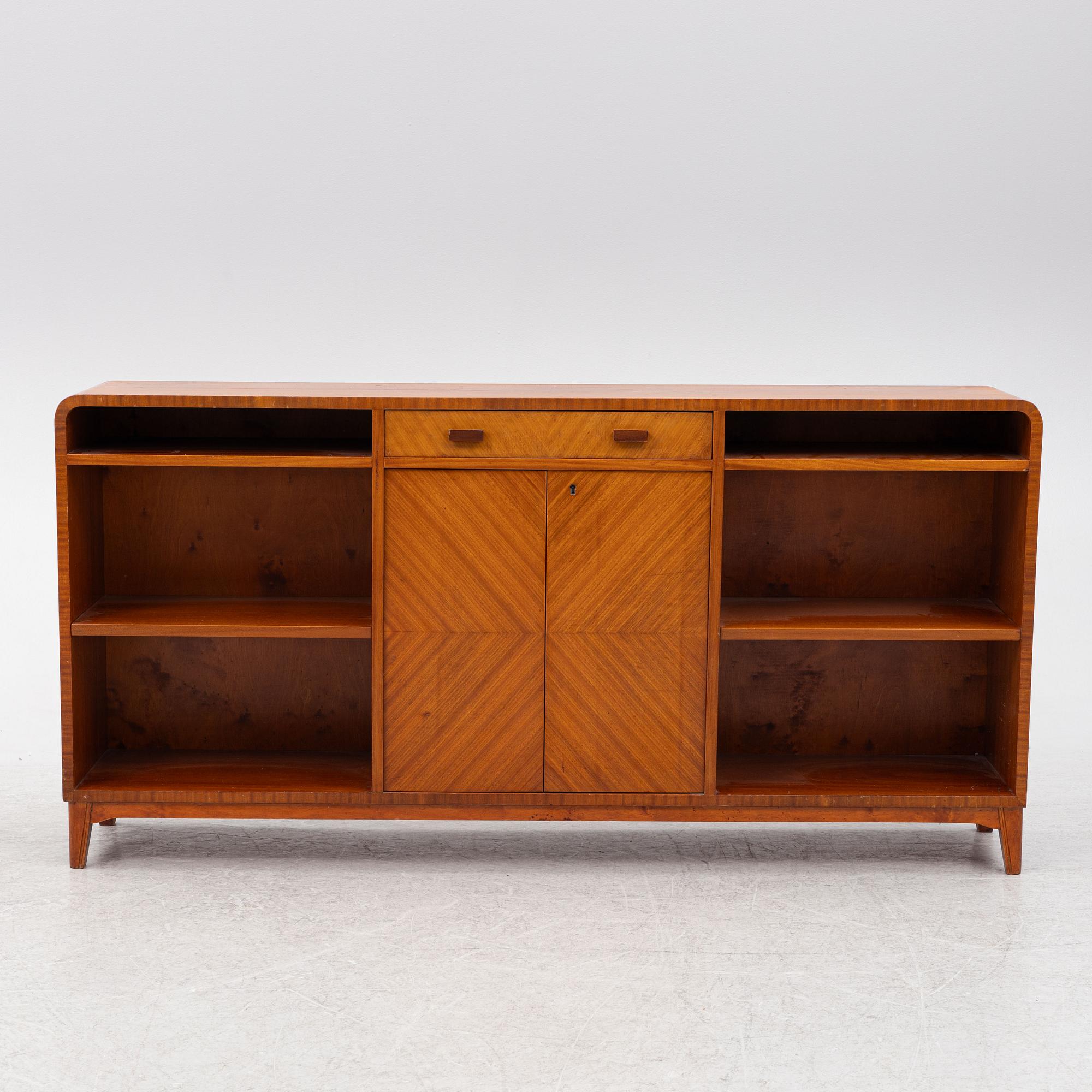 A ahogany-veneered 1940's/50's bookcase.