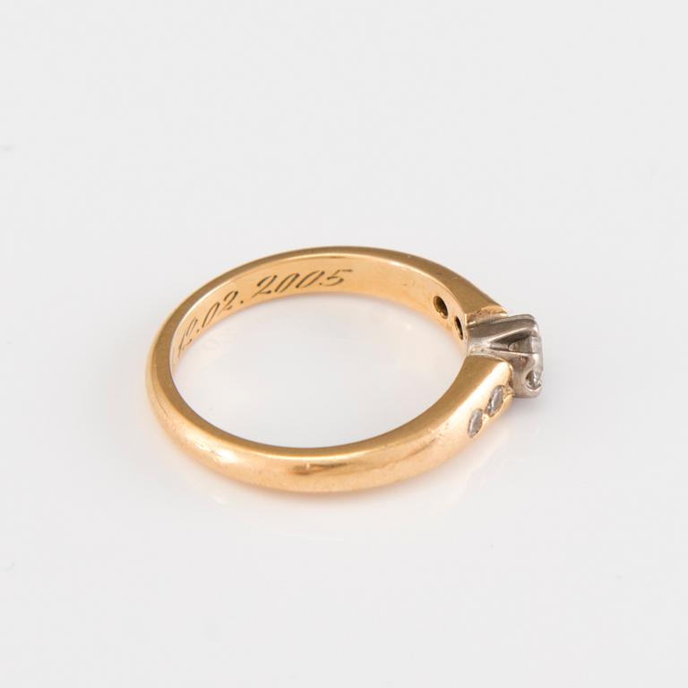 A 18K gold ring with diamonds by Tillander Oy Ab, Turku, Finland 2004.