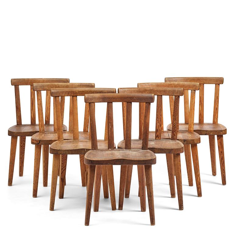 Axel Einar Hjorth, a set of seven stained pine "Utö" chairs, Nordiska Kompaniet, Sweden, 1930s.