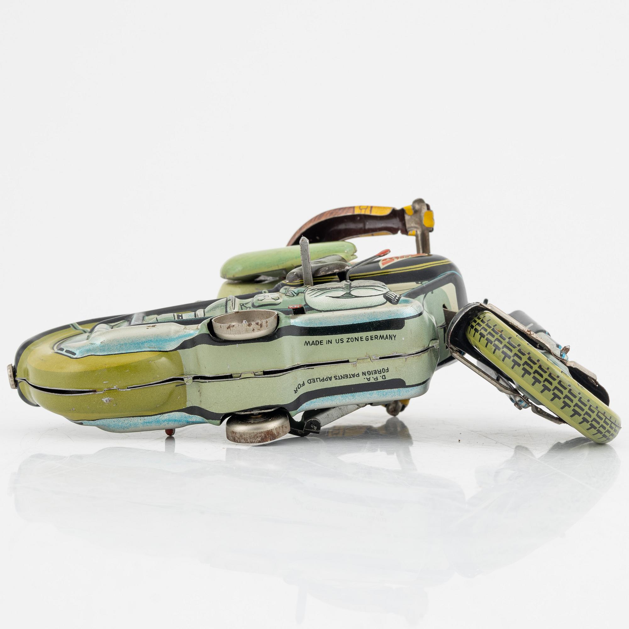 A tin motorcycle, 'Mac 700' from Arnold, Germany, around mid 20th Century.