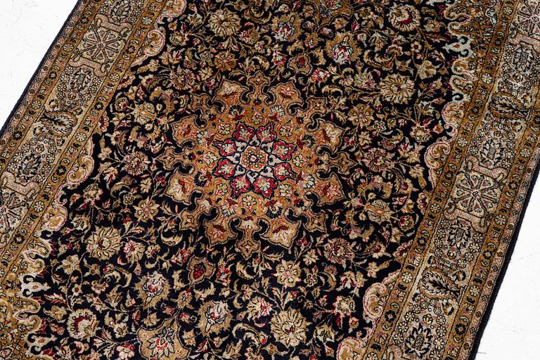 A Ghom, silk rug, c. 162 x 102 cm.