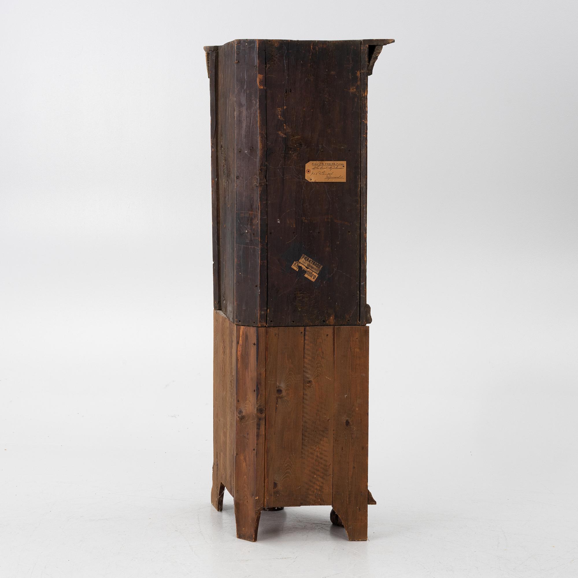 Corner cabinet, dated 1800.