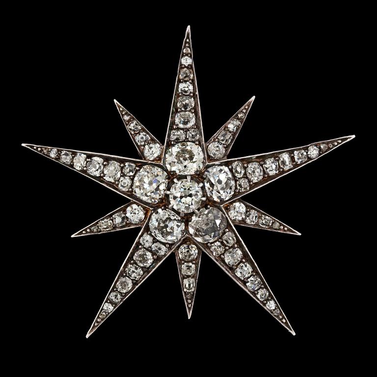 An antique cut diamond star brooch, tot. app. 8.50 cts. C. 1880.