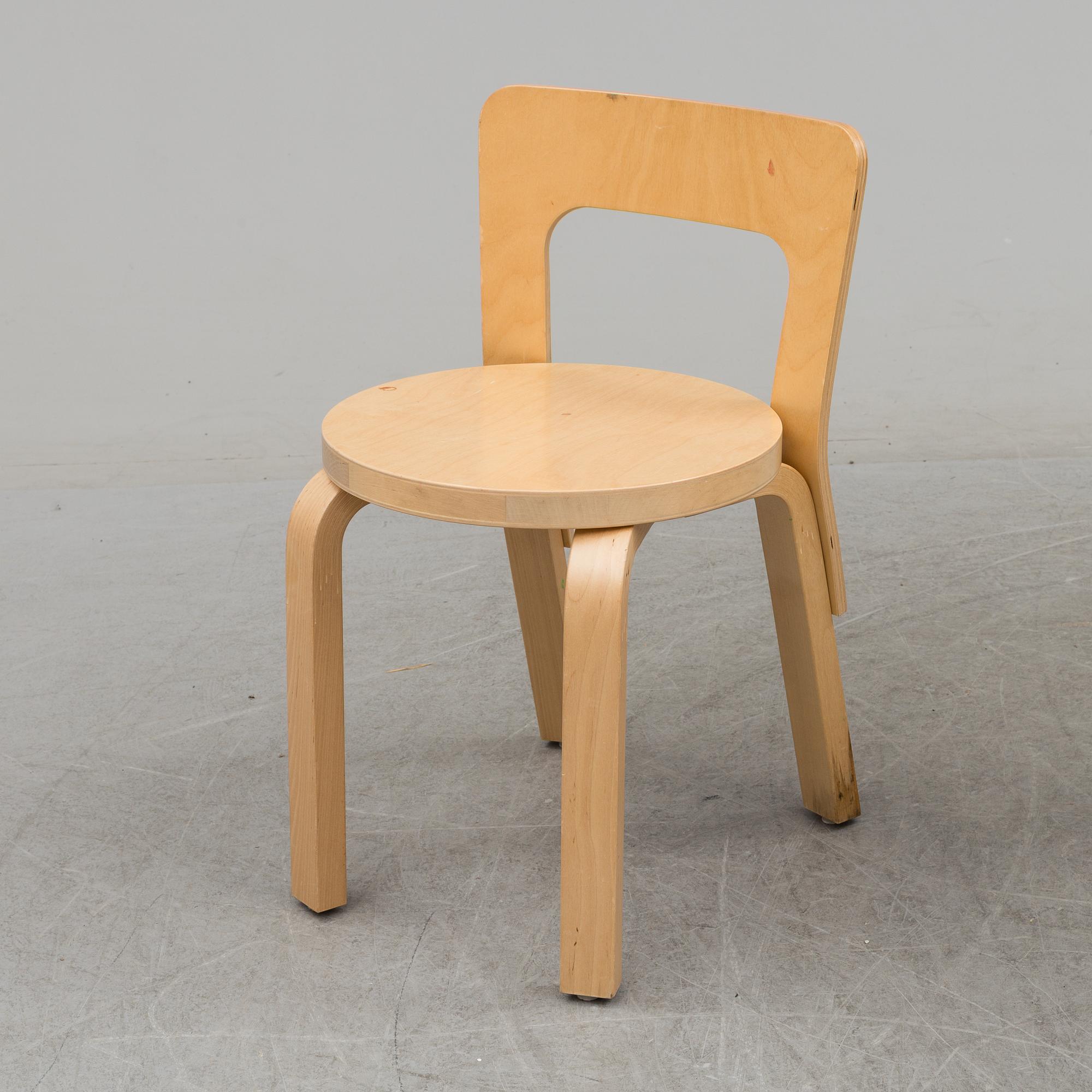 ALVAR AALTO, table and chair. Late 1900s / early 21th century.