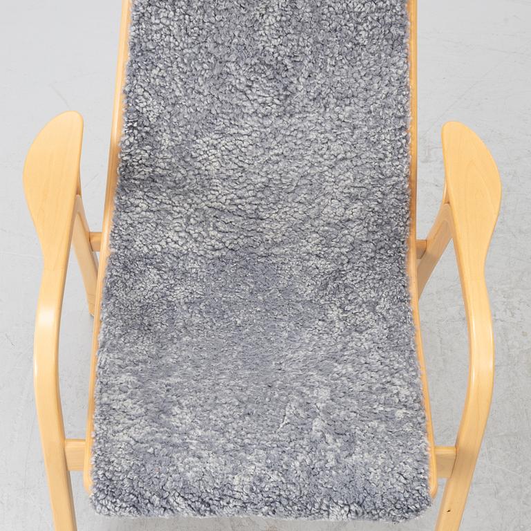 Yngve Ekström, karmstolar, ett par, "Lamino", Swedese, Sweden, 2011.