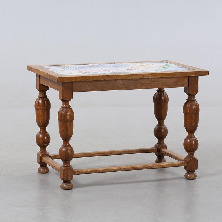 A SMALL TABLE DECORATED BY MARTIN POSER, dated 1944.