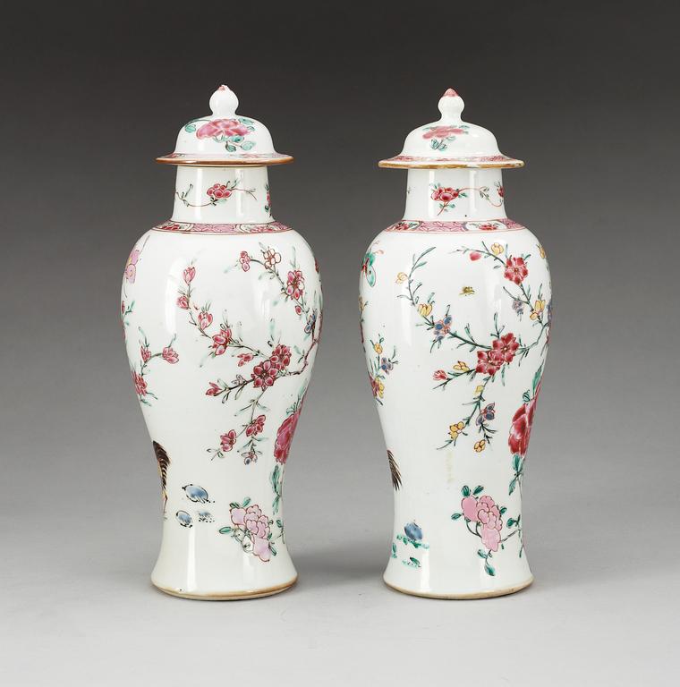 A pair of famille rose 'rooster' vases with covers, Qing dynasty, Qianlong (1736-95).