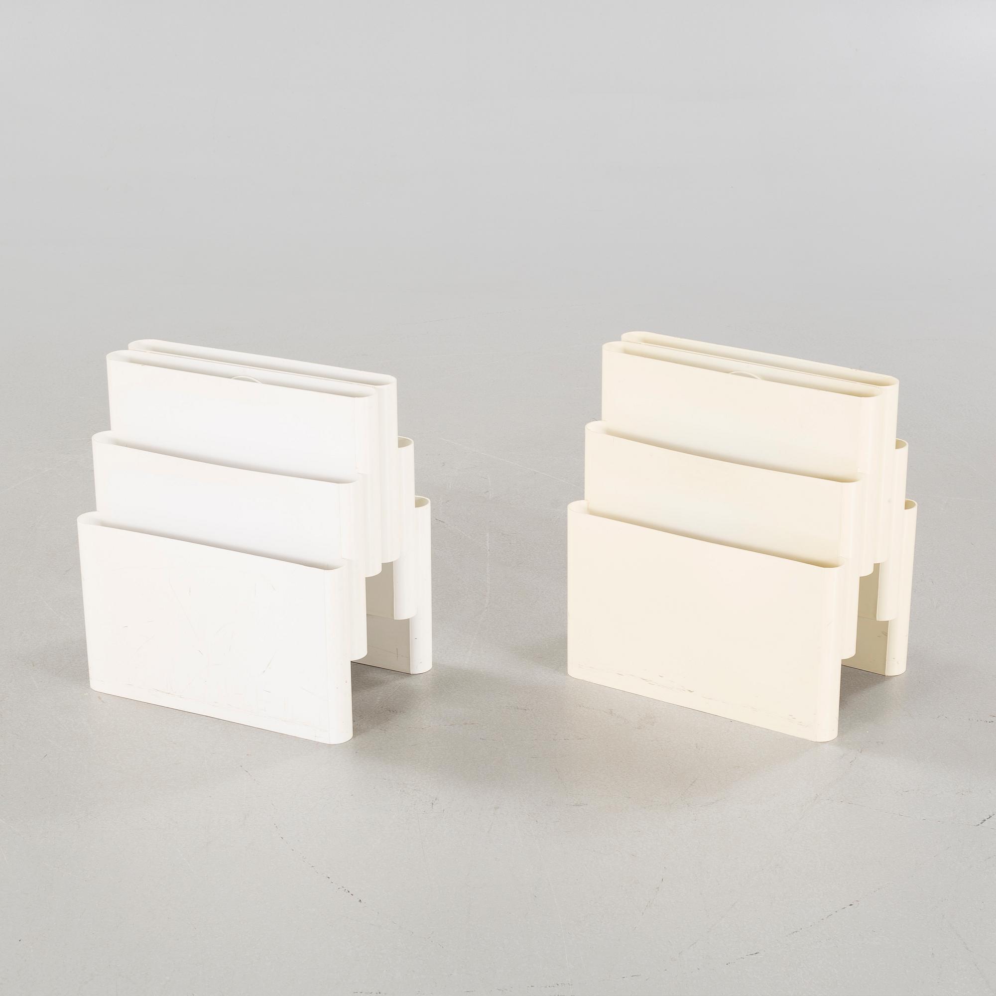 A pair of magazine racks, designed by Giotto Stoppino  for Kartell.