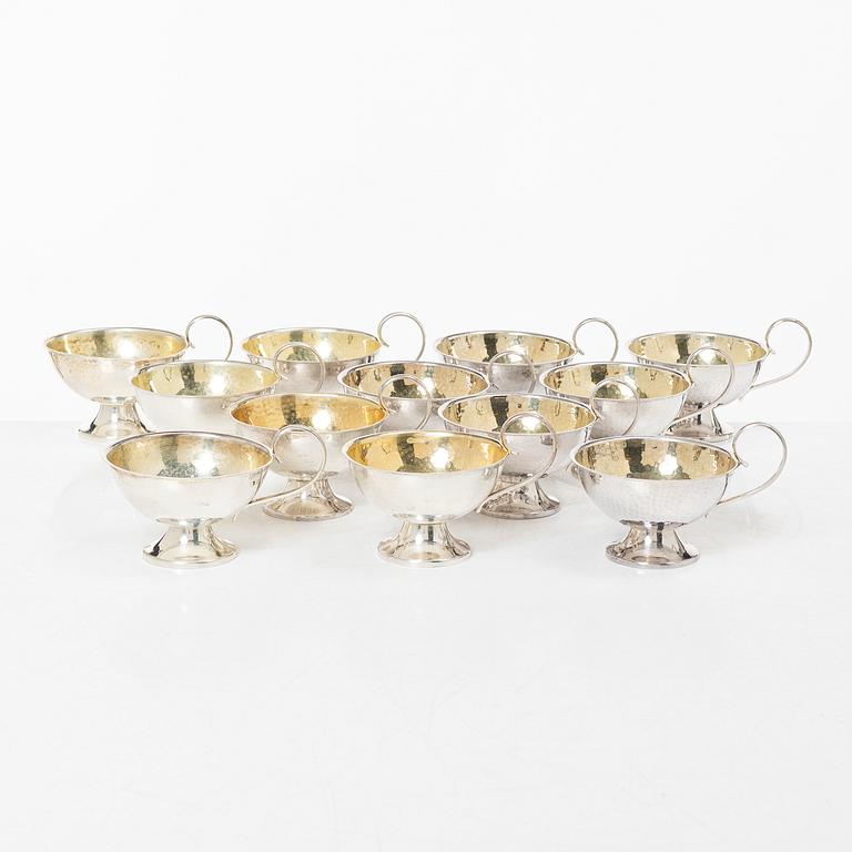 Twelve silver mugs, K&EC, Gothenburg, 1949-62.
