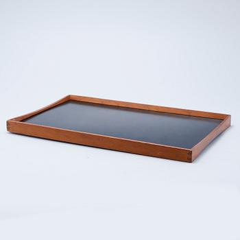 A table tray, model designed by Finn Juhl in 1965.