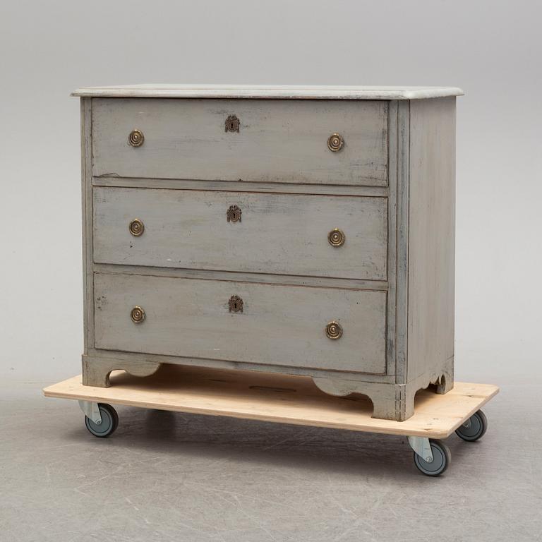A mid 19th century painted chest of drawers.