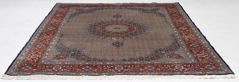 A Moud carpet, part silk, signed, c. 345 x 249 cm.