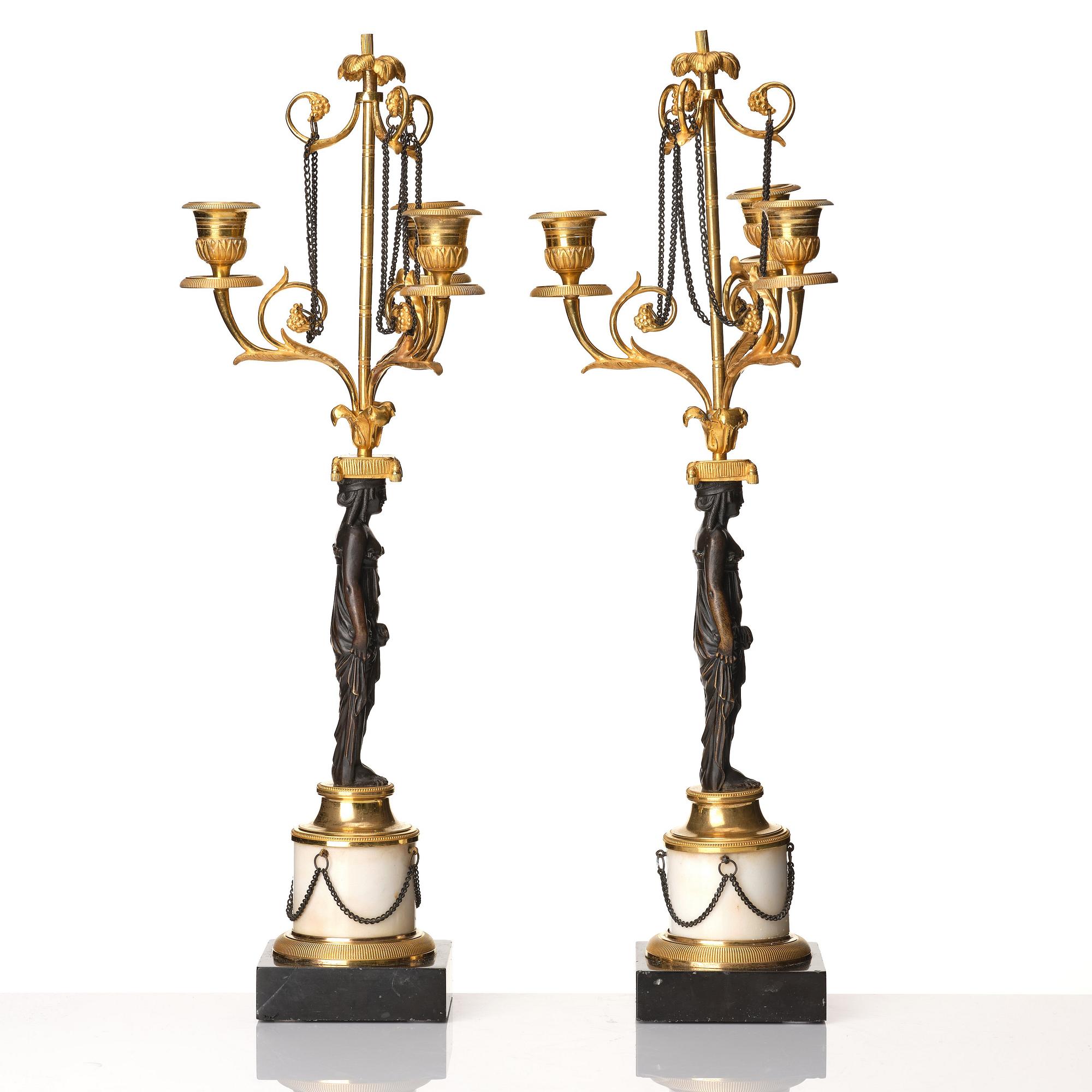 A pair of late Gustavian circa 1800 three-light candelabra, attributed to F L Rung.