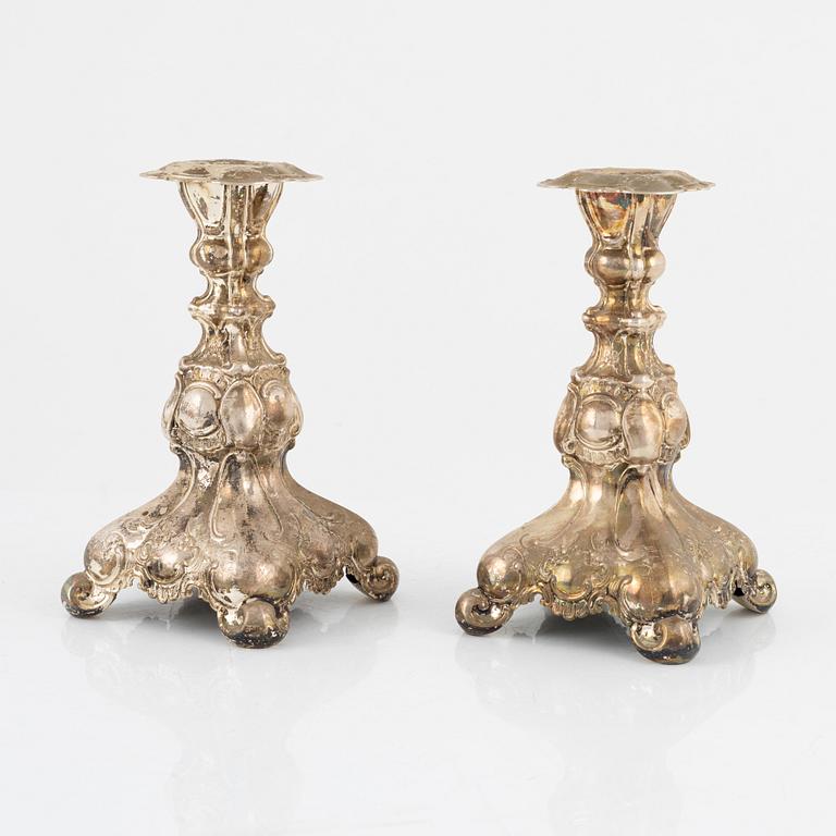 A pair of Swedish silver candlesticks, bearing the mark of GAB Stockholm, 1949.