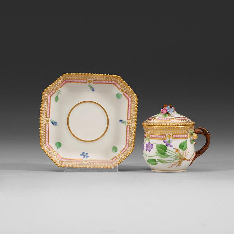 A set of 17 Royal Copenhagen ´Flora Danica´ custard cups with covers and stands, 20th century.