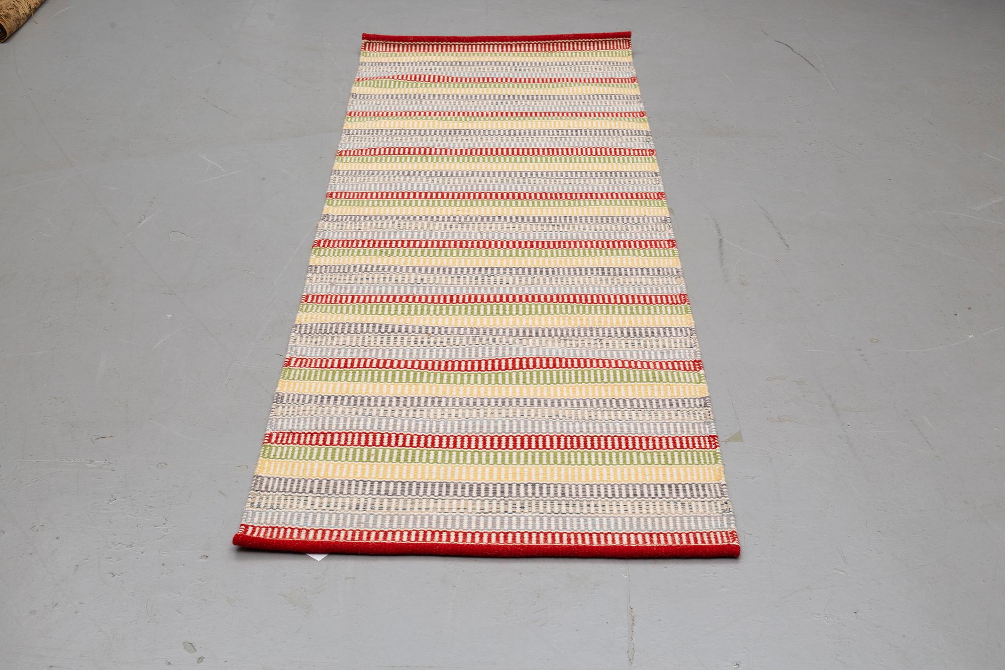 A RUNNER, flat weave, ca 254 x 84 cm.