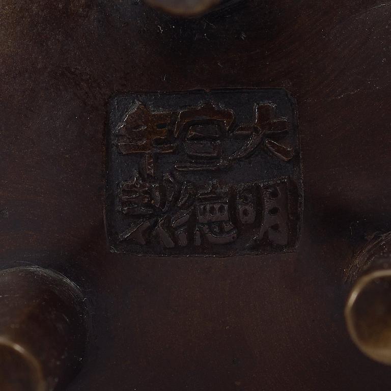 A bronze tripod censer, Qing dynasty, 19th Century with Xuandes six character mark.