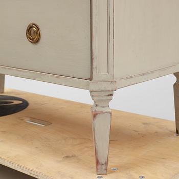 A Gustavian style chest of drawers, early 20th Century.