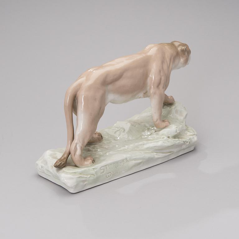 An Amphora porcelain figurine 2882, impressed mark Strasser Wien.