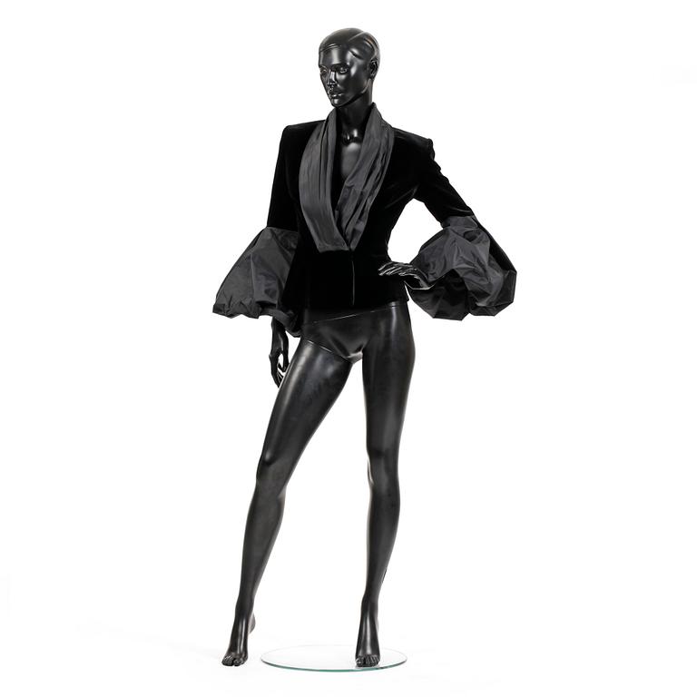 ARMANI, a black velvet evening jacket with silk details.