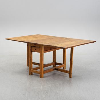A 19th century gate-leg table.