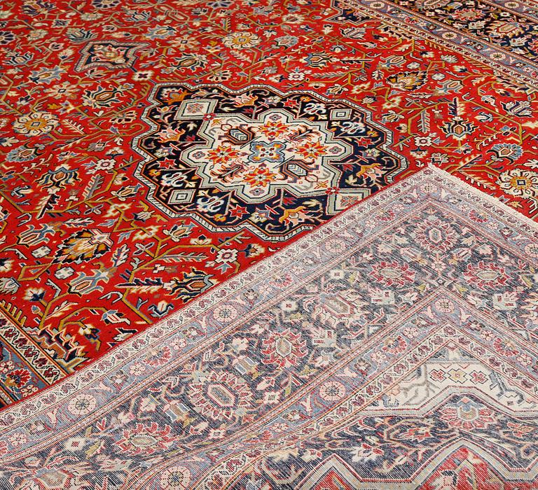 A Kashan carpet, c 350 x 240 cm.