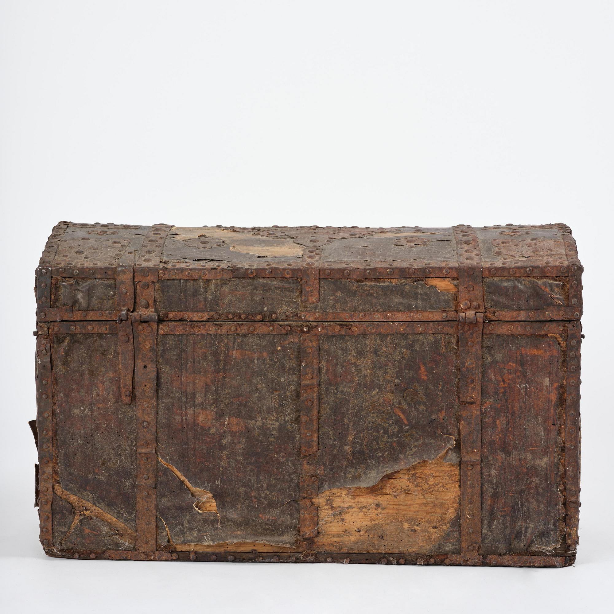 A Dutch baroque iron-bound and leather clad chest, later part 17th century.
